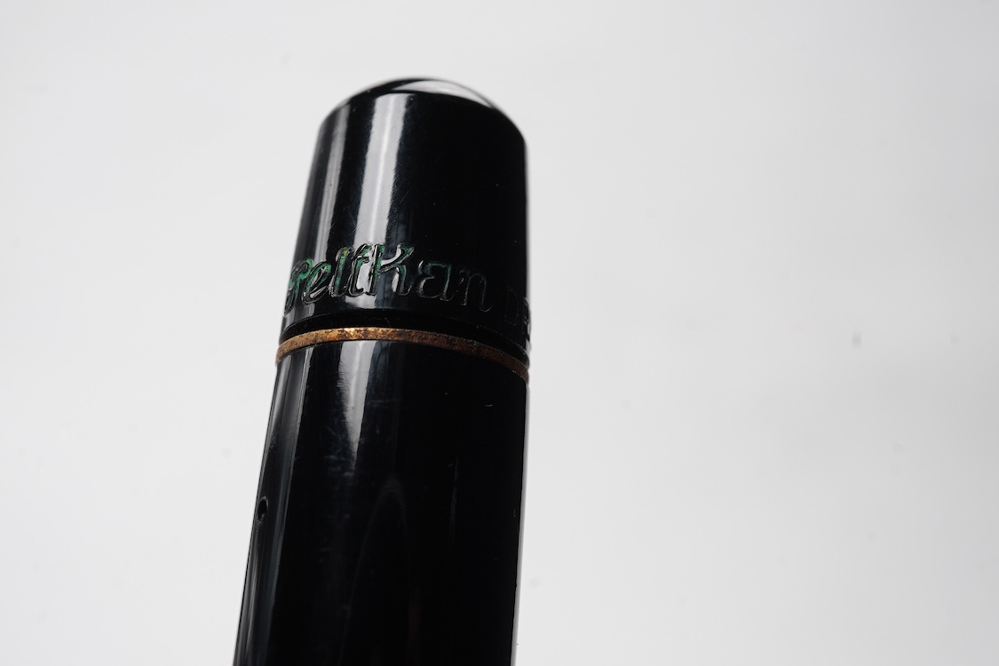 A Pelikan 100N fountain pen fitted with a 14ct. gold Pelkan nib